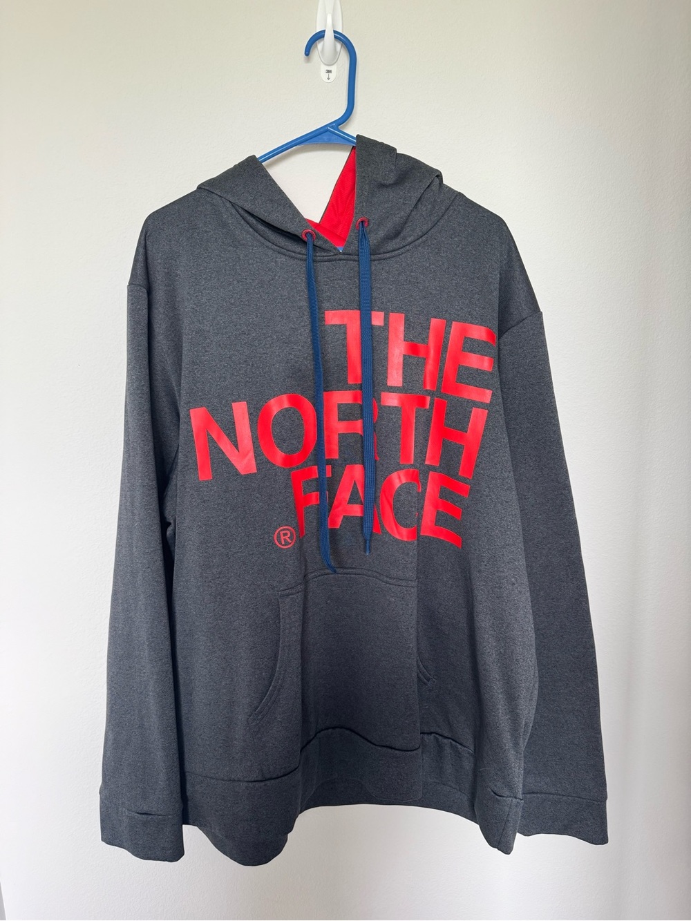 The North Face Charcoal Gray Pullover Hoodie with Red Logo